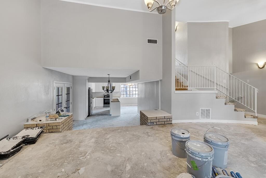 2305 Cherry Hill Road Texarkana, TX 75503 - Photo 4 of 20 a living room with furniture and a chandelier
