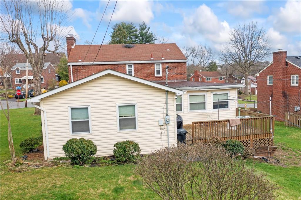 332 Rockhill Road Pittsburgh, PA 15243 - Photo 18 of 20 a view of a house with a yard and sitting area