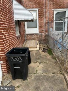 3203 Kenyon Avenue Baltimore, MD 21213 - Photo 13 of 28 a view of a refrigerator and a stove