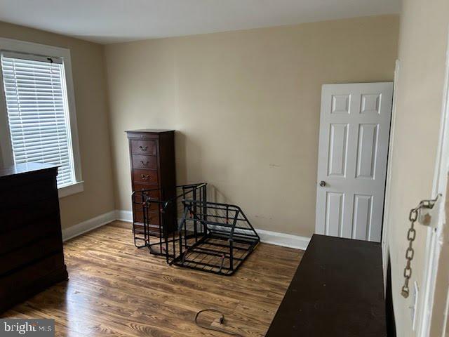 3203 Kenyon Avenue Baltimore, MD 21213 - Photo 22 of 28 a view of a room with furniture and wooden floor