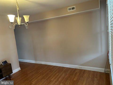 3203 Kenyon Avenue Baltimore, MD 21213 - Photo 3 of 28 a view of a room with wooden floor
