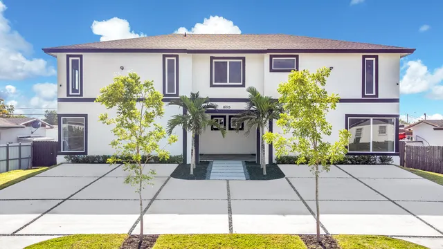 a front view of house with yard