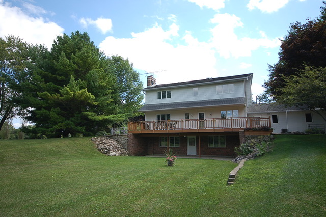 44W482 Ramm Road Maple Park, IL 60151 - Photo 15 of 25 a view of a big house with a big yard and large tree