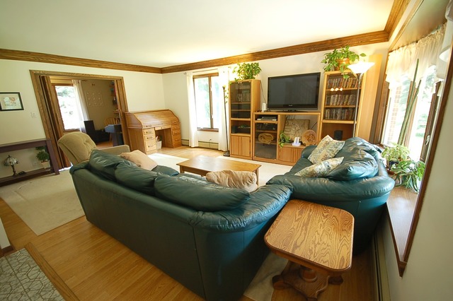44W482 Ramm Road Maple Park, IL 60151 - Photo 5 of 25 a living room with furniture and a flat screen tv