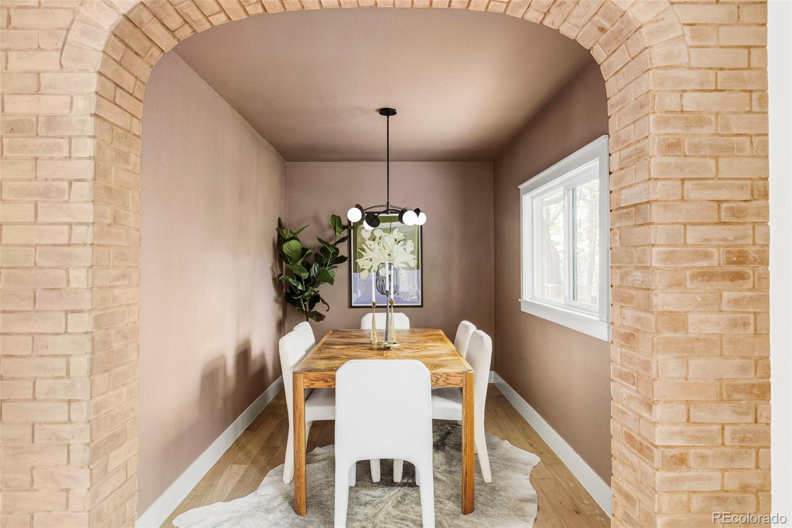 1380 Ithaca Drive Boulder, CO 80305 - Photo 13 of 34 a dining room with furniture and window