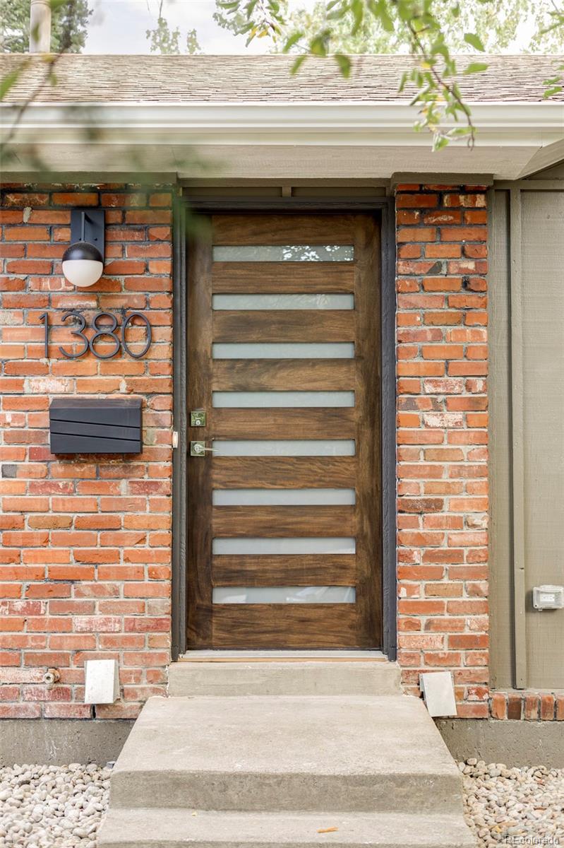 1380 Ithaca Drive Boulder, CO 80305 - Photo 3 of 34 a view of a door of the house and front door