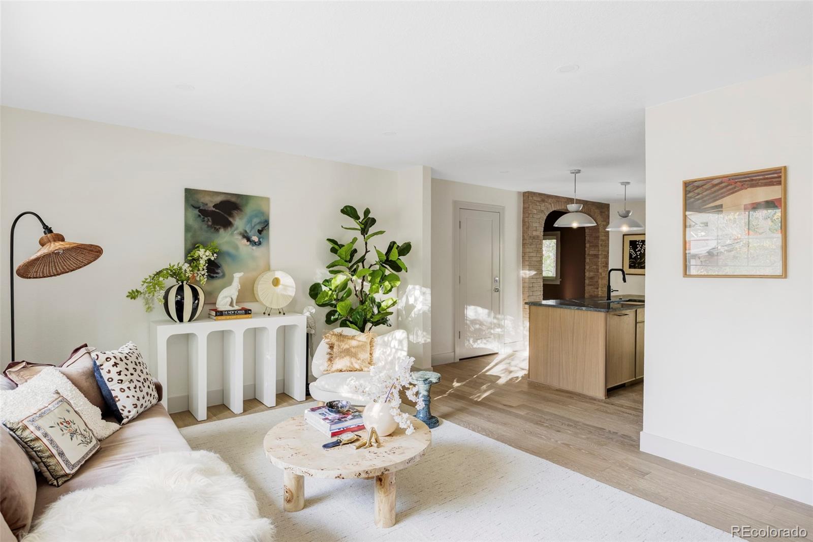1380 Ithaca Drive Boulder, CO 80305 - Photo 4 of 34 a living room with furniture and flowers