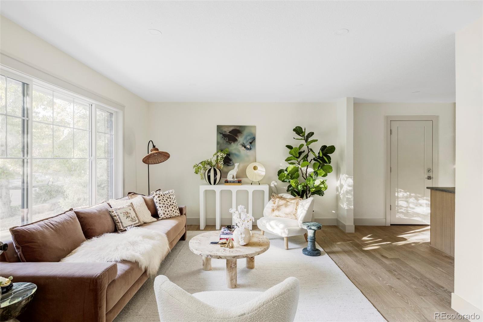 1380 Ithaca Drive Boulder, CO 80305 - Photo 6 of 34 a living room with furniture and a large window
