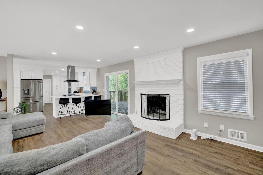 4420 Lavista Road Tucker, GA 30084 - Photo 11 of 36 a living room with furniture and fireplace