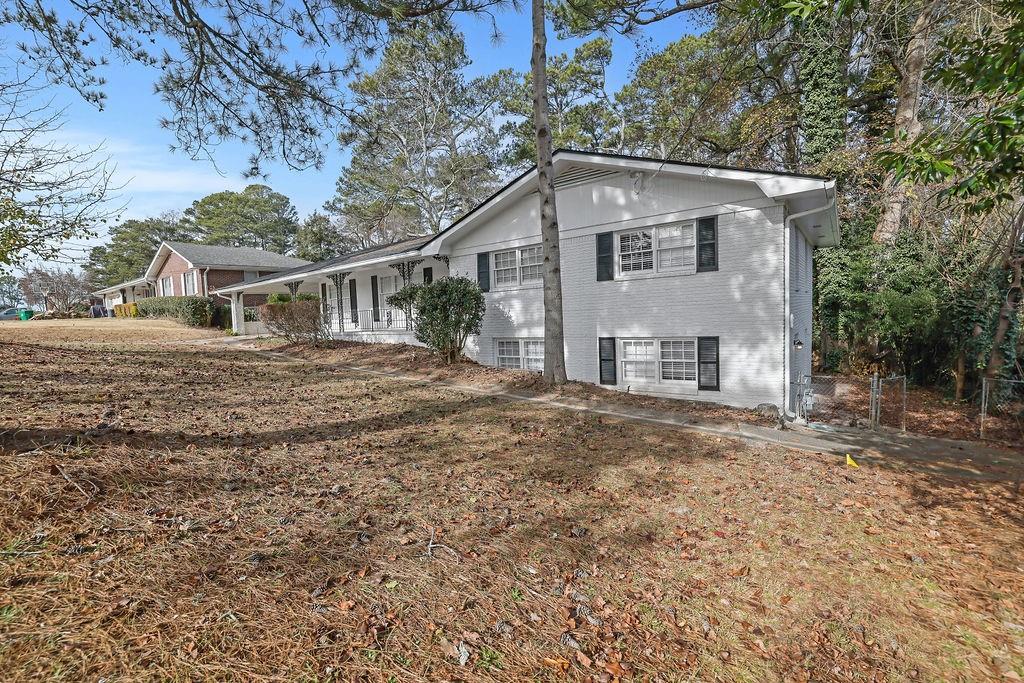 4420 Lavista Road Tucker, GA 30084 - Photo 2 of 36 a view of a house with a yard