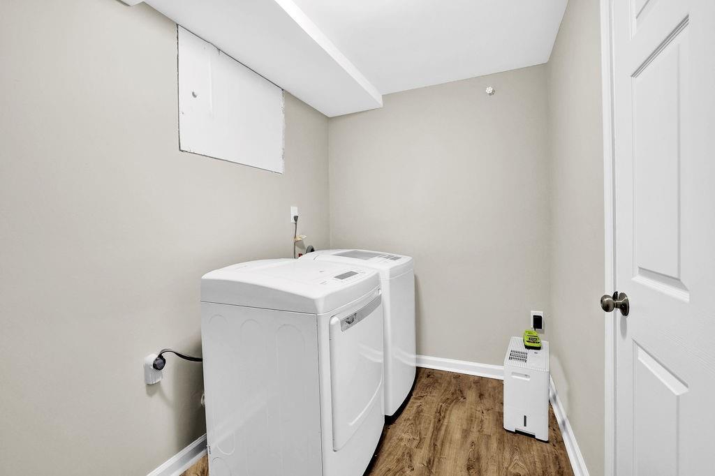 4420 Lavista Road Tucker, GA 30084 - Photo 25 of 36 a utility room with a sink a washer and dryer