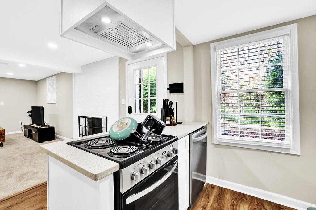 4420 Lavista Road Tucker, GA 30084 - Photo 27 of 36 a kitchen with a stove and a refrigerator