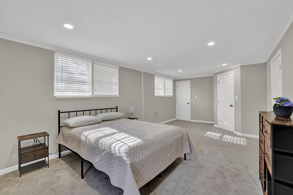 4420 Lavista Road Tucker, GA 30084 - Photo 29 of 36 a bedroom with a bed and a tv