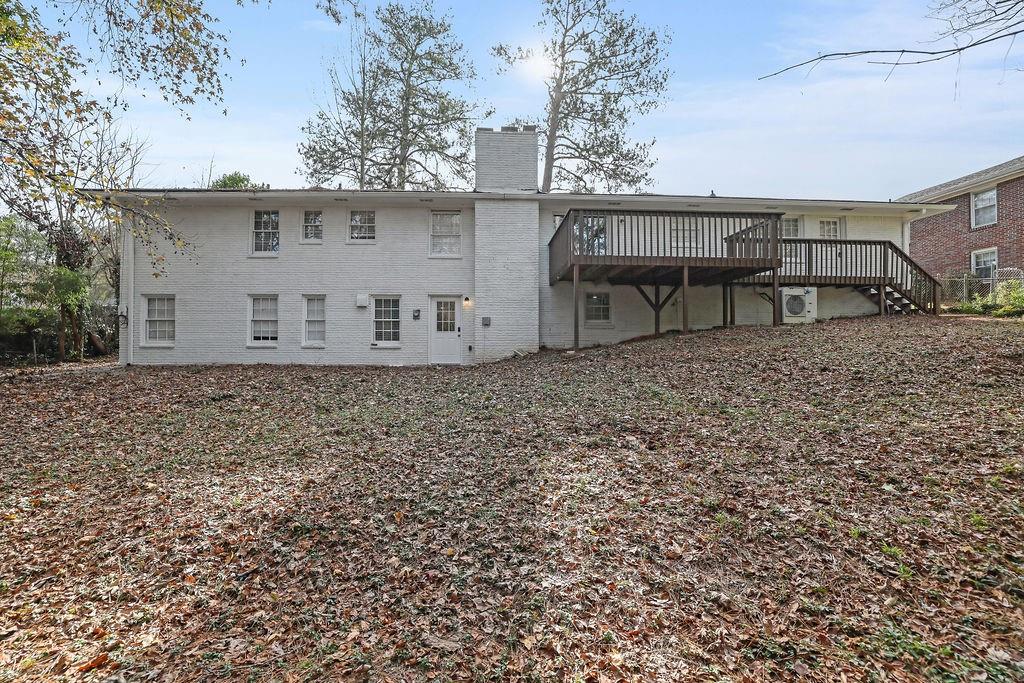 4420 Lavista Road Tucker, GA 30084 - Photo 36 of 36 front view of a house with a bench