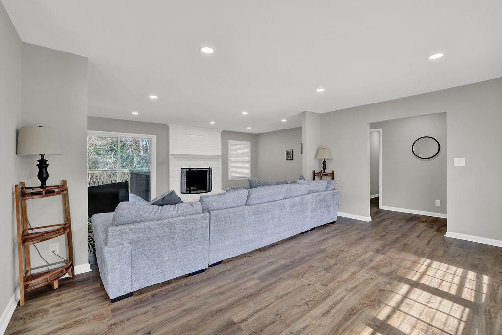 4420 Lavista Road Tucker, GA 30084 - Photo 6 of 36 a living room with furniture and a flat screen tv