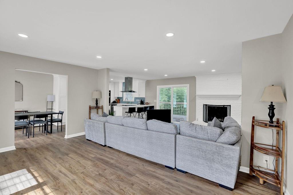 4420 Lavista Road Tucker, GA 30084 - Photo 8 of 36 a living room with furniture and a fireplace