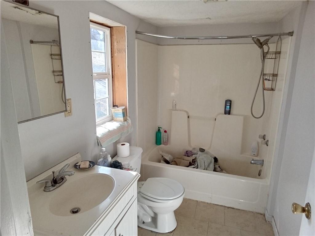 133 Slagle Avenue Butler, PA 16001 - Photo 11 of 14 a bathroom with a sink toilet and shower