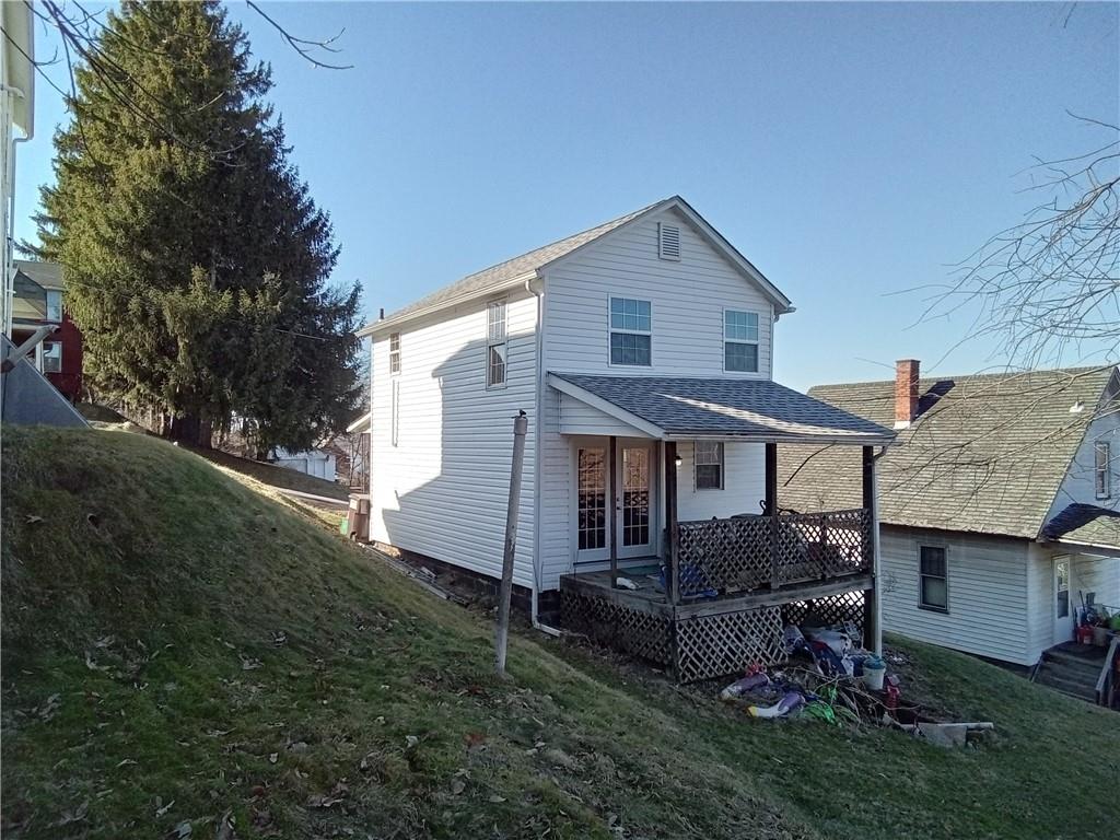133 Slagle Avenue Butler, PA 16001 - Photo 13 of 14 a view of backyard of house with green space