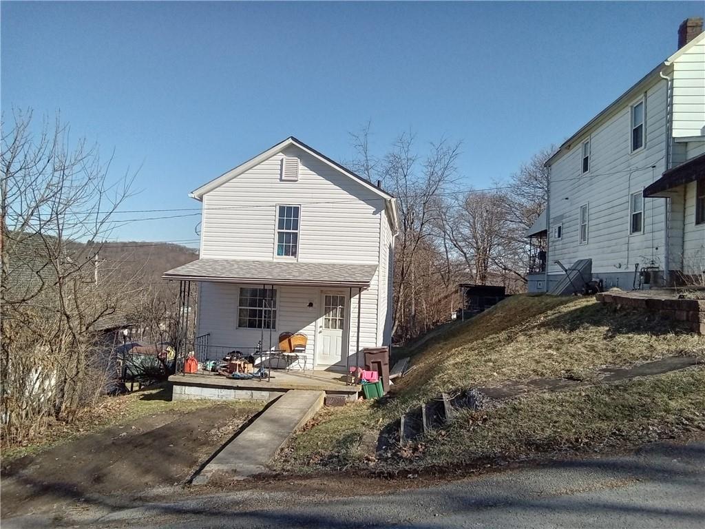 133 Slagle Avenue Butler, PA 16001 - Photo 4 of 14 a view of a house with a yard