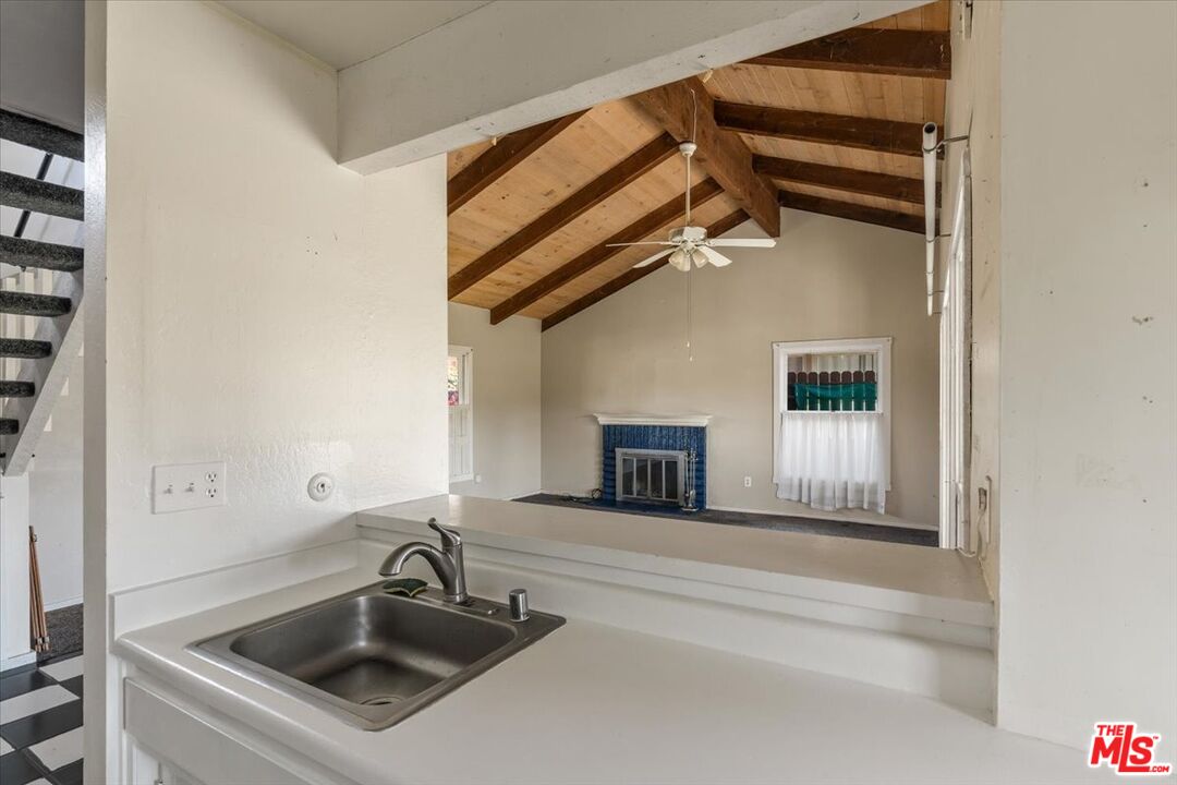 57 Meadow Lakes Drive Tehachapi, CA 93561 - Photo 12 of 26 a bathroom with a sink and a mirror