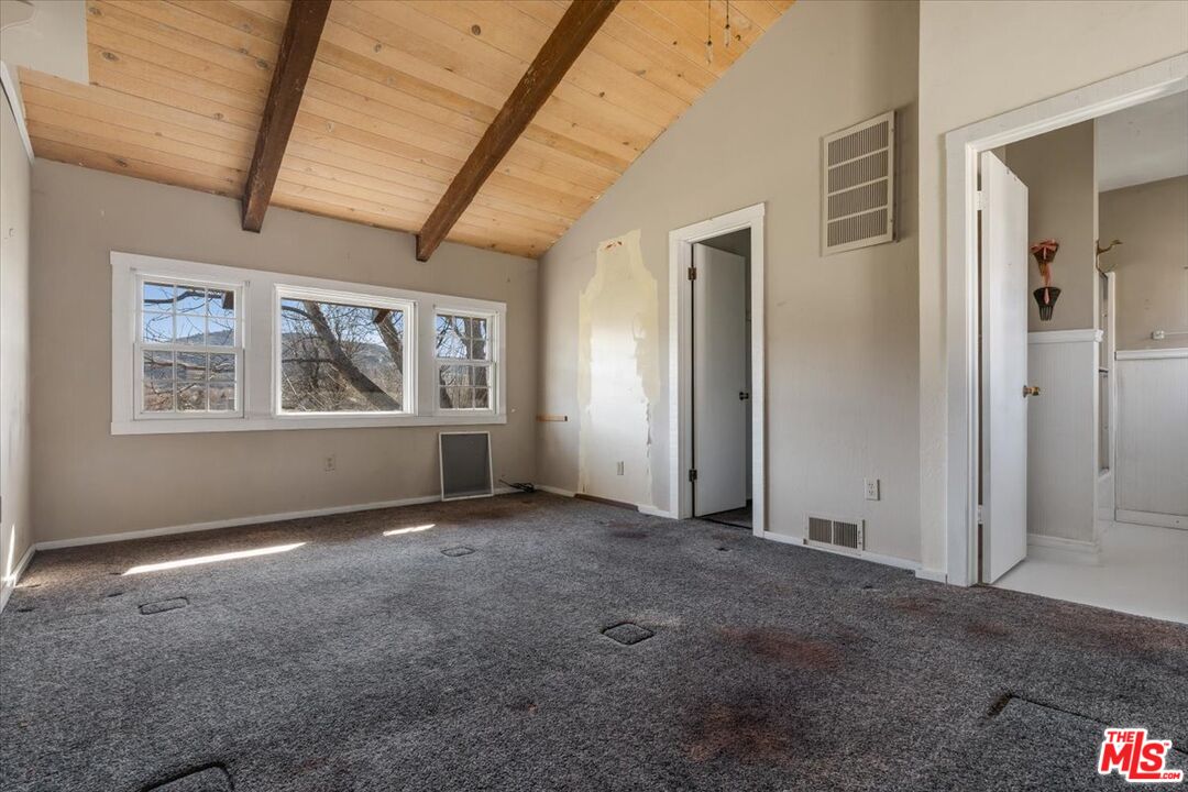 57 Meadow Lakes Drive Tehachapi, CA 93561 - Photo 16 of 26 an empty room with windows