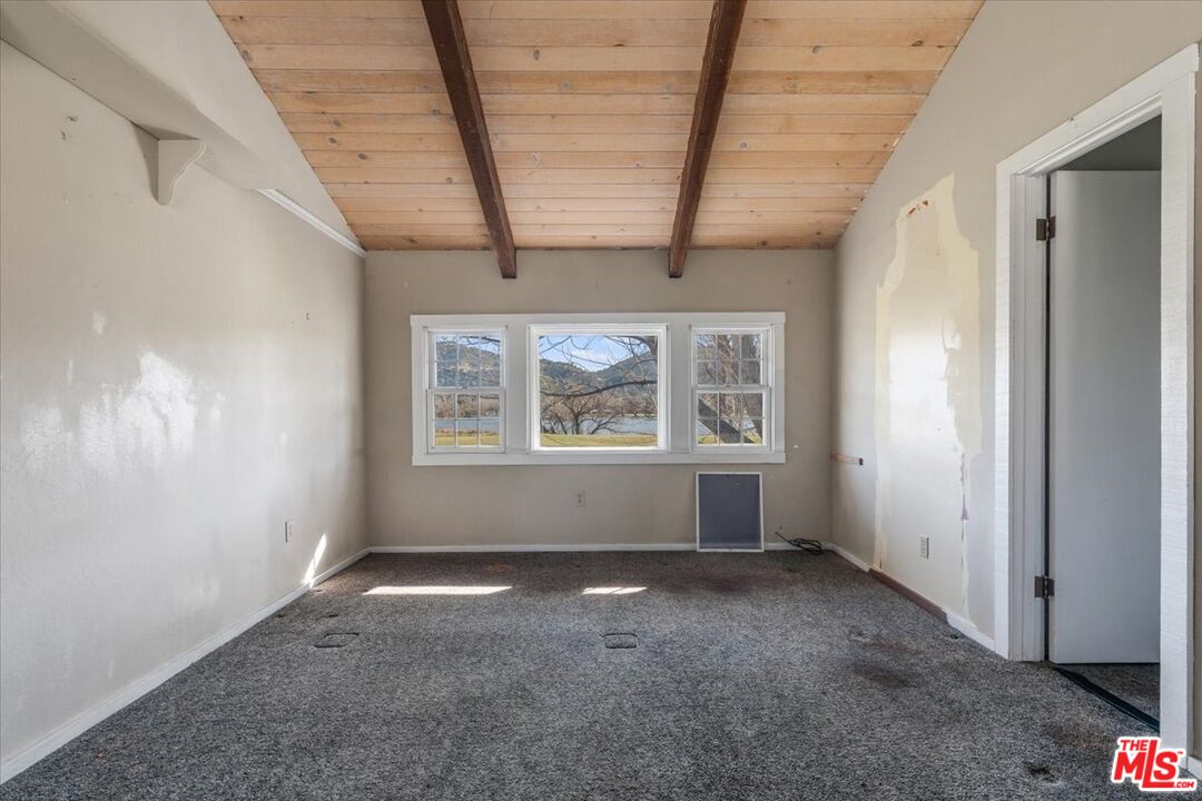 57 Meadow Lakes Drive Tehachapi, CA 93561 - Photo 17 of 26 an empty room with windows