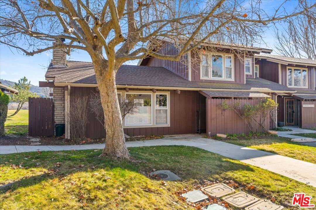 57 Meadow Lakes Drive Tehachapi, CA 93561 - Photo 2 of 26 a view of a house with a yard