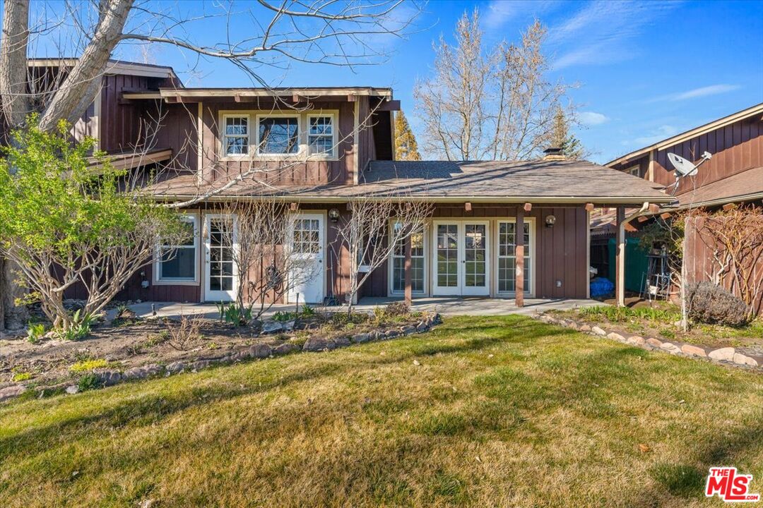 57 Meadow Lakes Drive Tehachapi, CA 93561 - Photo 25 of 26 a front view of a house with a garden