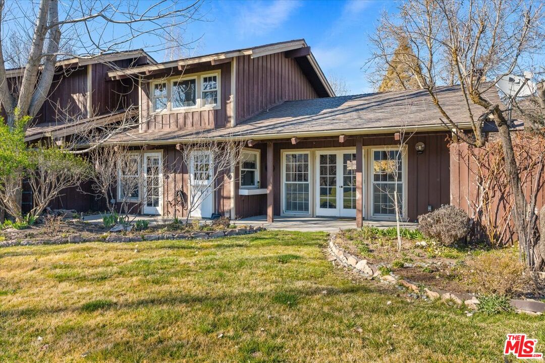 57 Meadow Lakes Drive Tehachapi, CA 93561 - Photo 26 of 26 a view of a house with a swimming pool