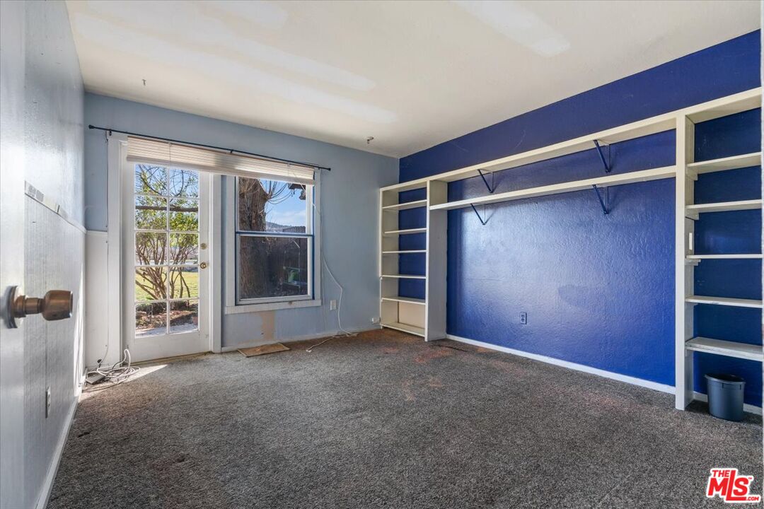 57 Meadow Lakes Drive Tehachapi, CA 93561 - Photo 4 of 26 a view of an empty room with a window