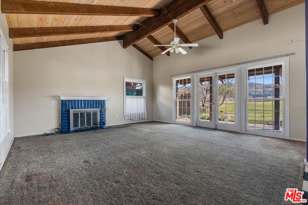 57 Meadow Lakes Drive Tehachapi, CA 93561 - Photo 6 of 26 a view of a big room with windows