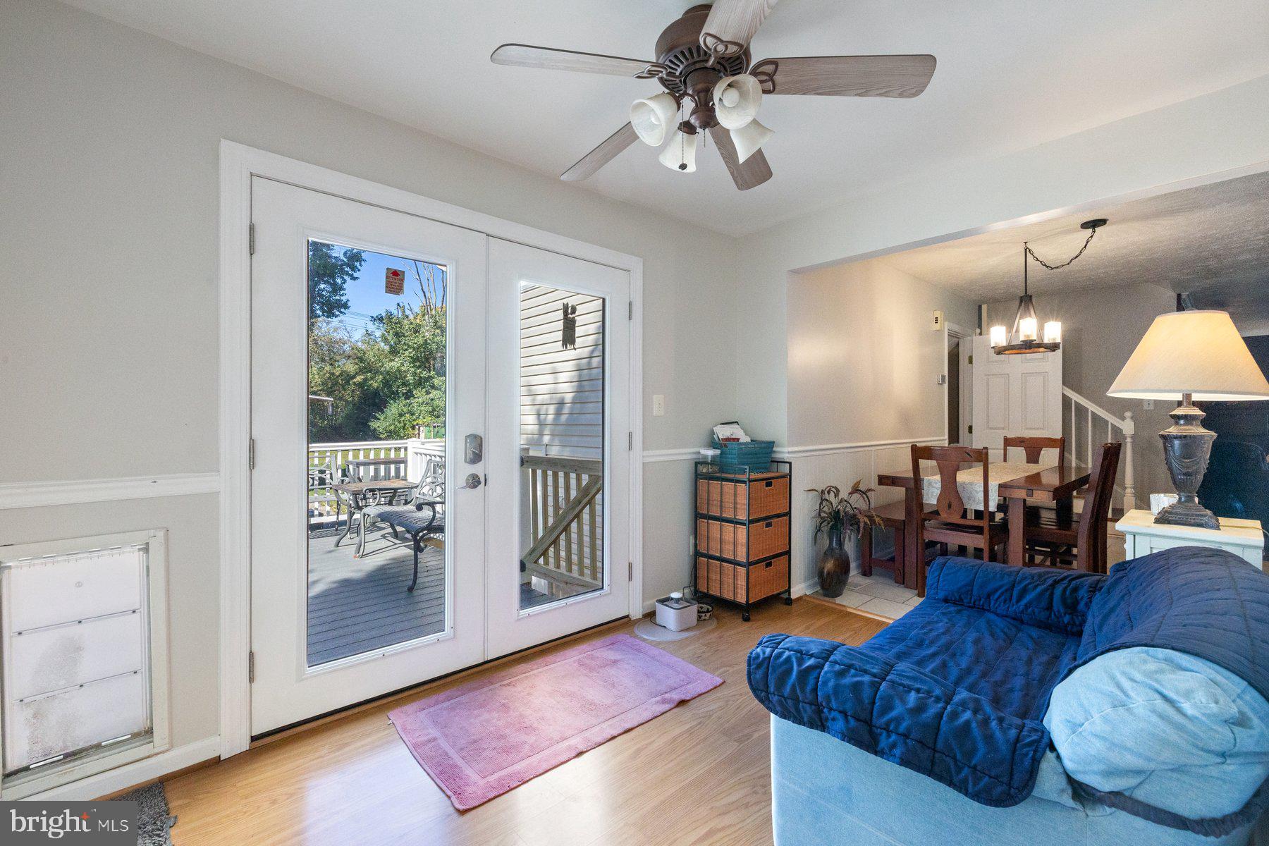 530 Rita Drive Odenton, MD 21113 - Photo 12 of 42 Sitting area/ Sun room doors lead to back deck