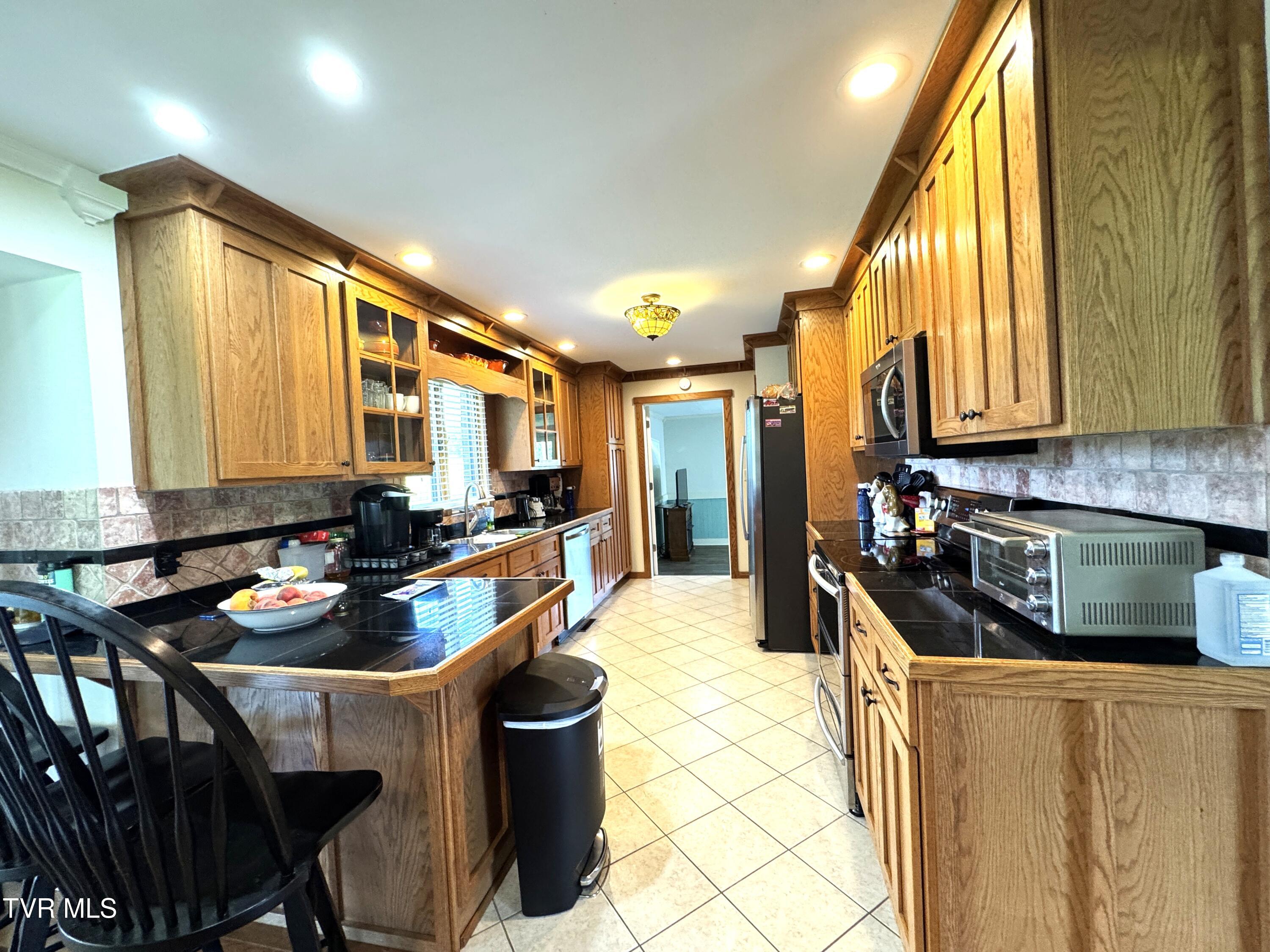 1935 East Stone Gap Road Big Stone Gap, VA 24219 - Photo 18 of 50 KITCHEN TOWARD MASTER SUITE 3