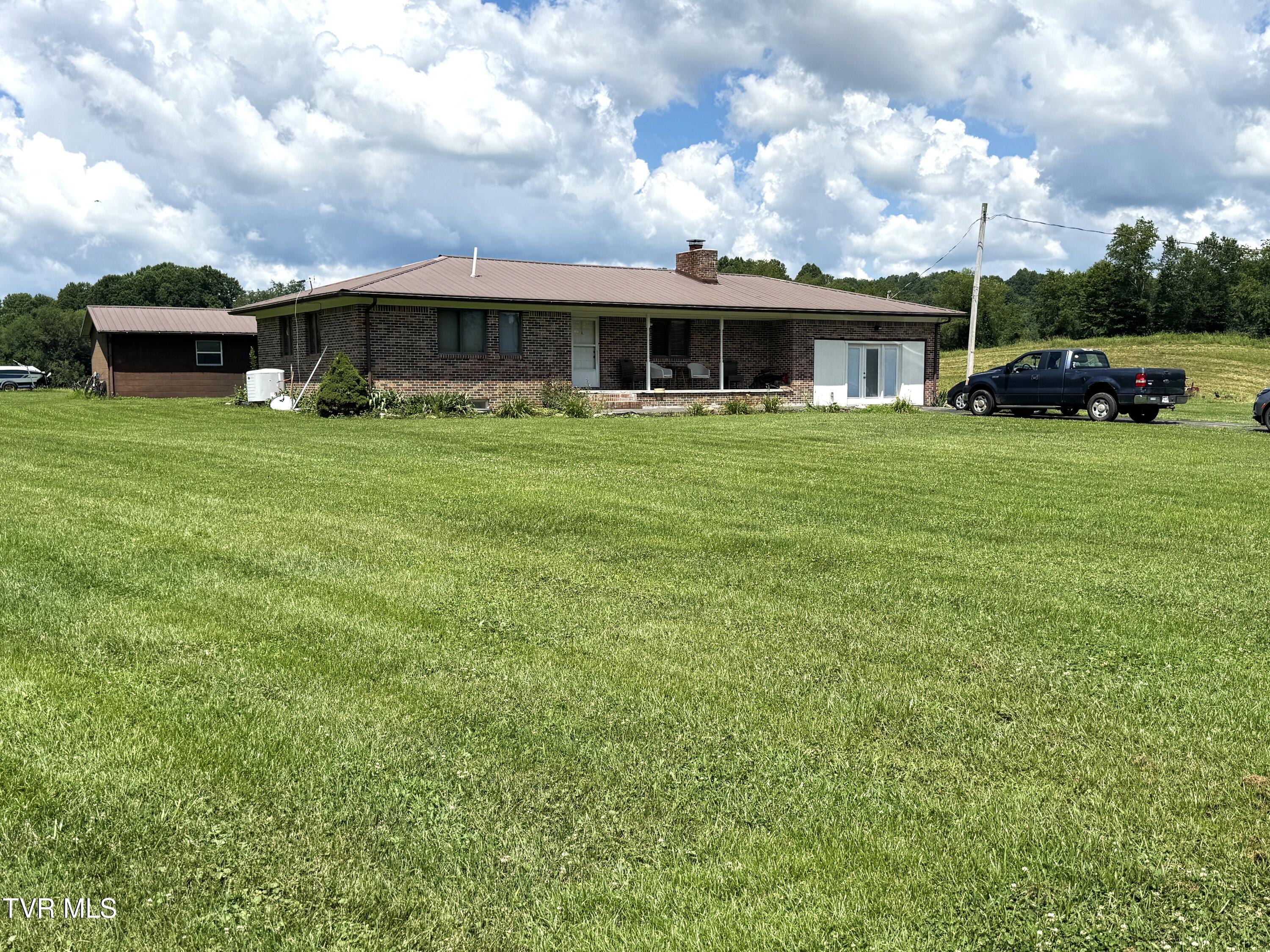 1935 East Stone Gap Road Big Stone Gap, VA 24219 - Photo 2 of 50 RIGHT FRONT VIEW WITH LOT