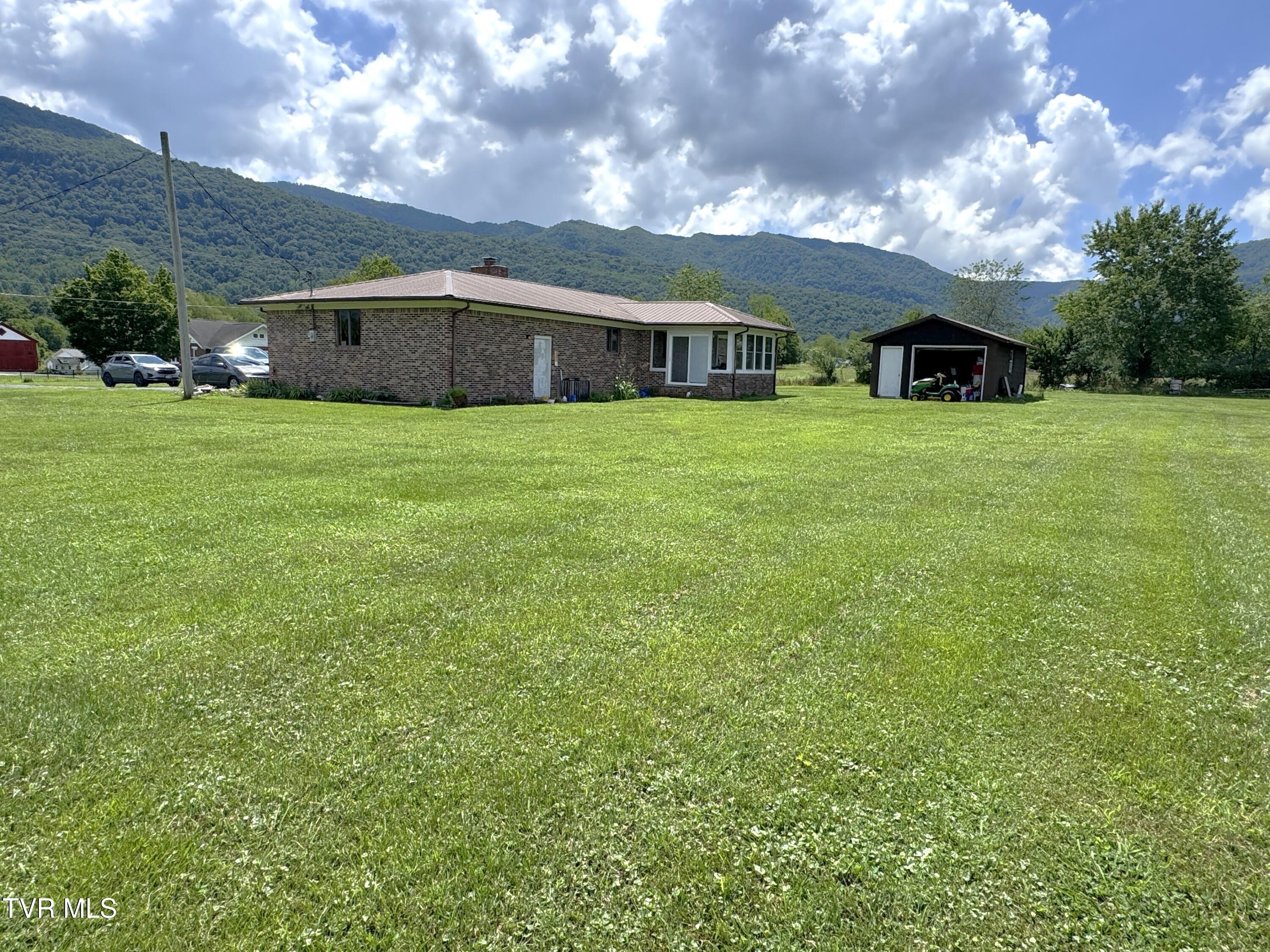 1935 East Stone Gap Road Big Stone Gap, VA 24219 - Photo 6 of 50 LEFT REAR CORNER VIEW WITH LOT