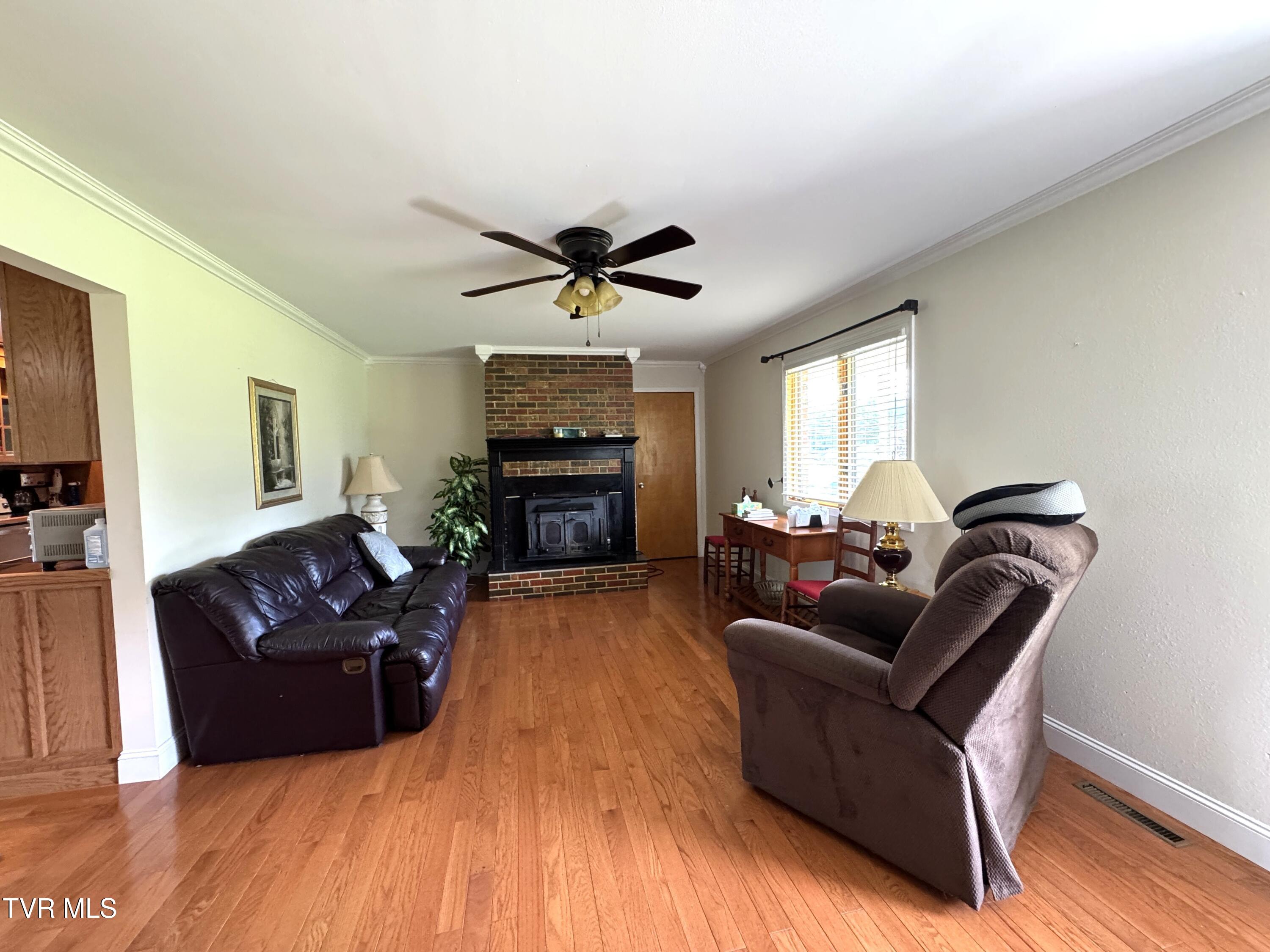 1935 East Stone Gap Road Big Stone Gap, VA 24219 - Photo 9 of 50 LIVING ROOM TOWARD FIREPLACE