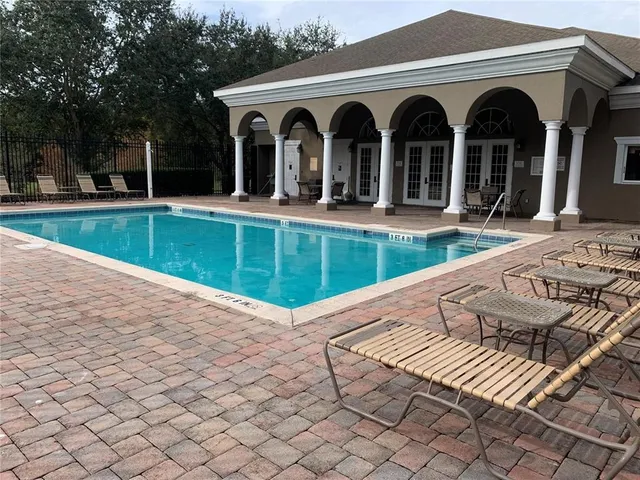 a car parked in front of a house