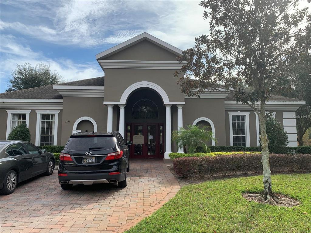 3121 Capri Isle Way Orlando, FL 32835 - Photo 30 of 37 a car parked in front of a house