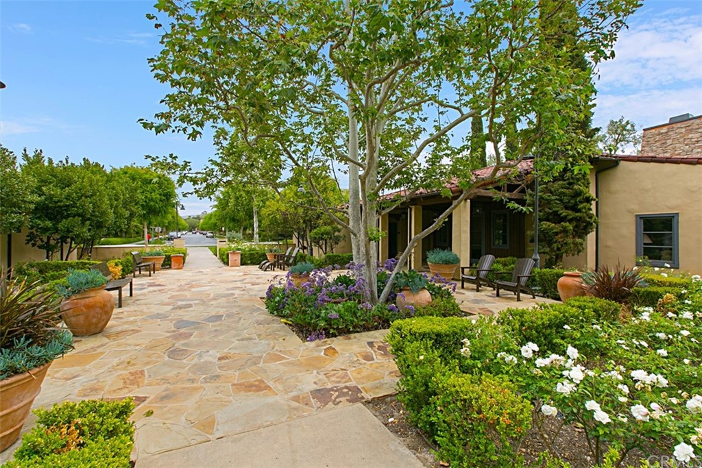 51 Secret Garden Irvine, CA 92620 - Photo 20 of 28 a view of a backyard with sitting area