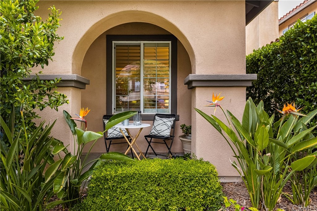 51 Secret Garden Irvine, CA 92620 - Photo 2 of 28 a house with garden in front of it