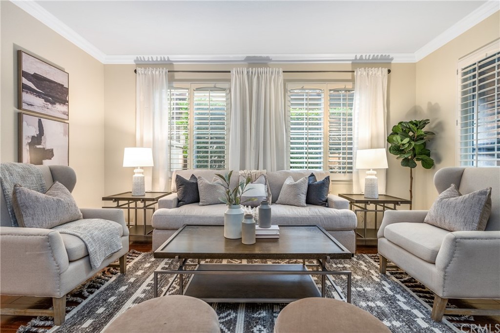 51 Secret Garden Irvine, CA 92620 - Photo 4 of 28 a living room with furniture or couch and a large window