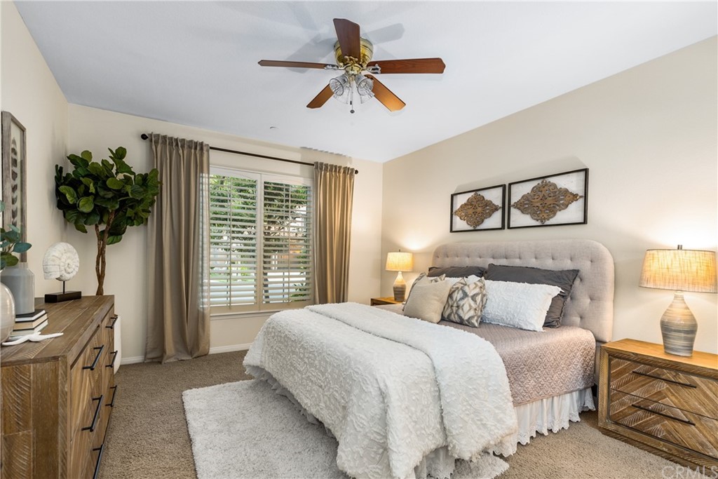 51 Secret Garden Irvine, CA 92620 - Photo 10 of 28 a bedroom with a bed potted plant with the window