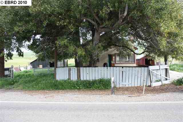 1882 Manning Road Livermore, CA 94551 - Photo 1 of 1 a view of a house with a small yard and large trees