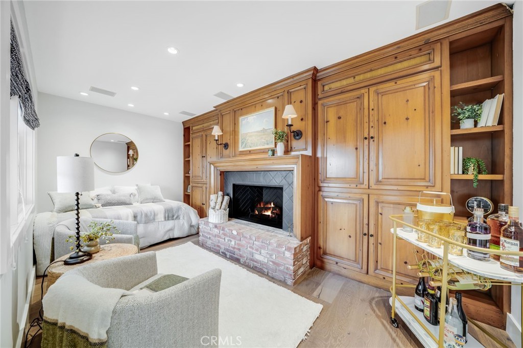 360 Diamond Street Laguna Beach, CA 92651 - Photo 19 of 36 a living room with furniture and a fireplace