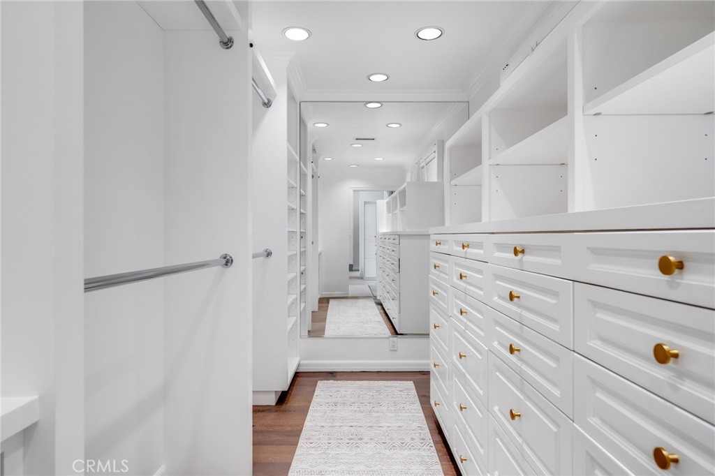 360 Diamond Street Laguna Beach, CA 92651 - Photo 24 of 36 a view of a hallway with white doors