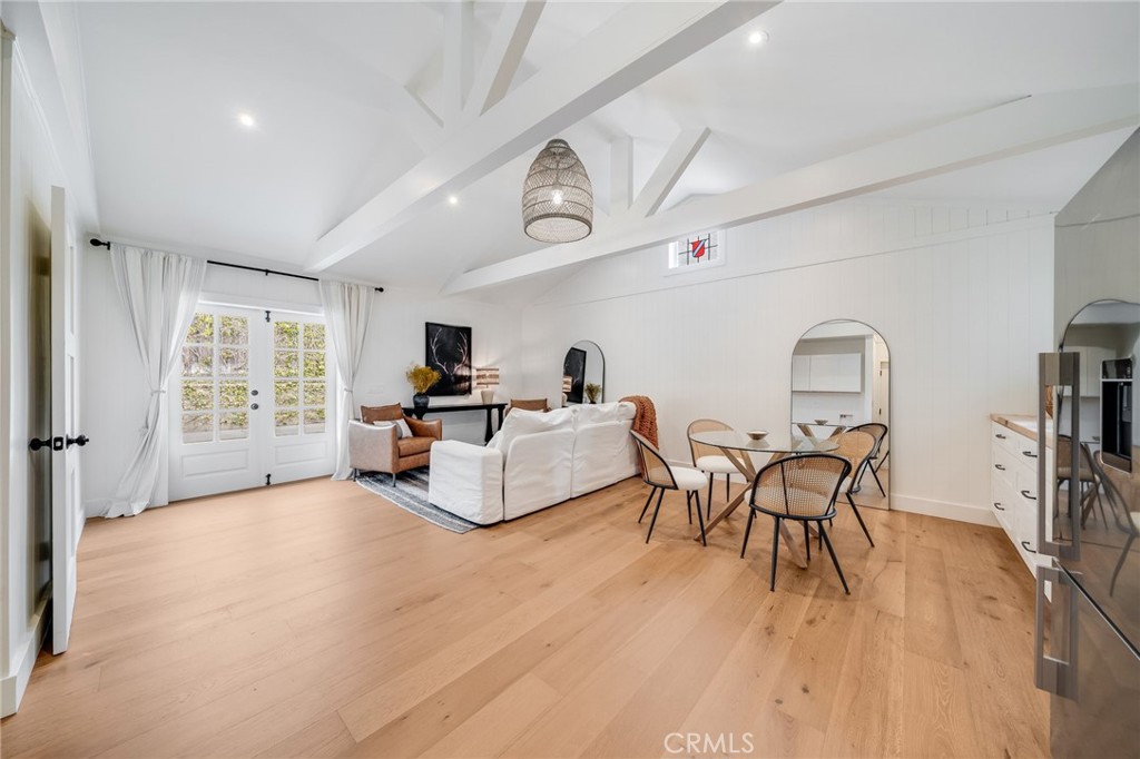 360 Diamond Street Laguna Beach, CA 92651 - Photo 26 of 36 a living room with furniture and a wooden floor