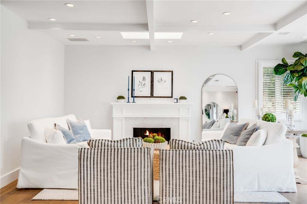 360 Diamond Street Laguna Beach, CA 92651 - Photo 6 of 36 a living room with furniture and a fireplace