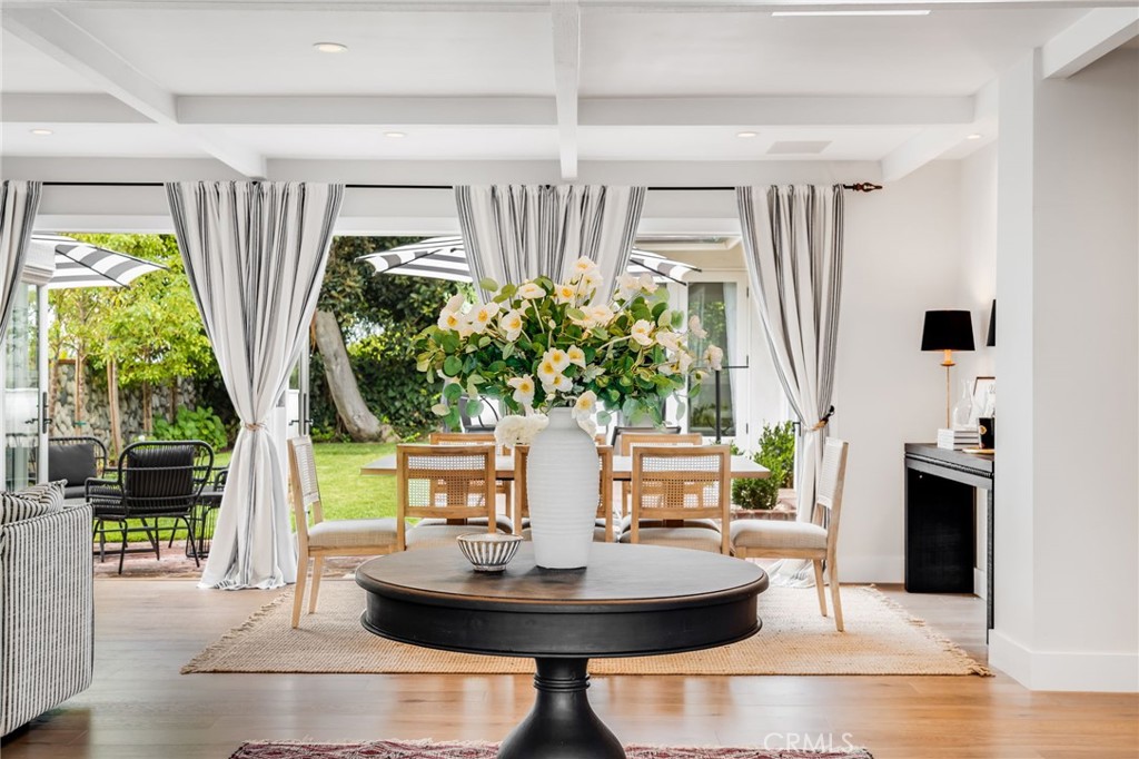 360 Diamond Street Laguna Beach, CA 92651 - Photo 9 of 36 a living room with fireplace furniture and a potted plant