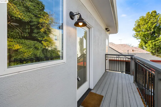 a view of a patio with table and chairs