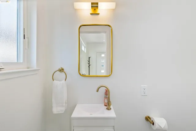 a bathroom with a mirror